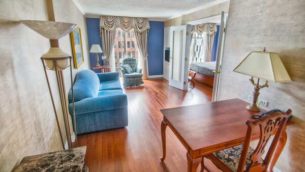 Family suite with two double beds and a sofa bed, two rooms, street view at Palace Royal.