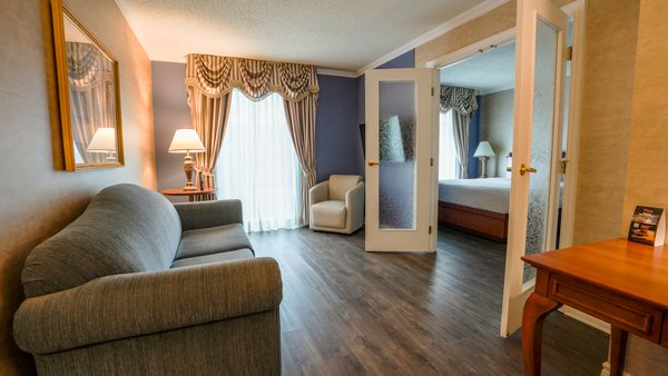 Family suite with two double beds and a sofa bed, two rooms, street view at Palace Royal.