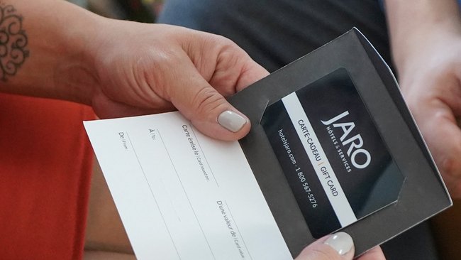 JARO gift card held by a hand