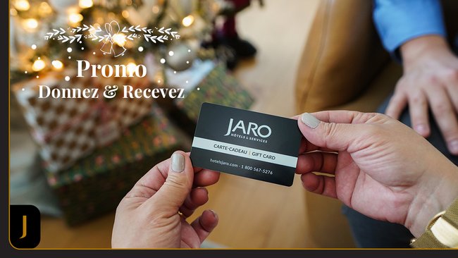 Carte-cadeau JARO tenue par une main, symbole d'évasion et de moments inoubliables dans les hôtels, restaurants et services de détente JARO