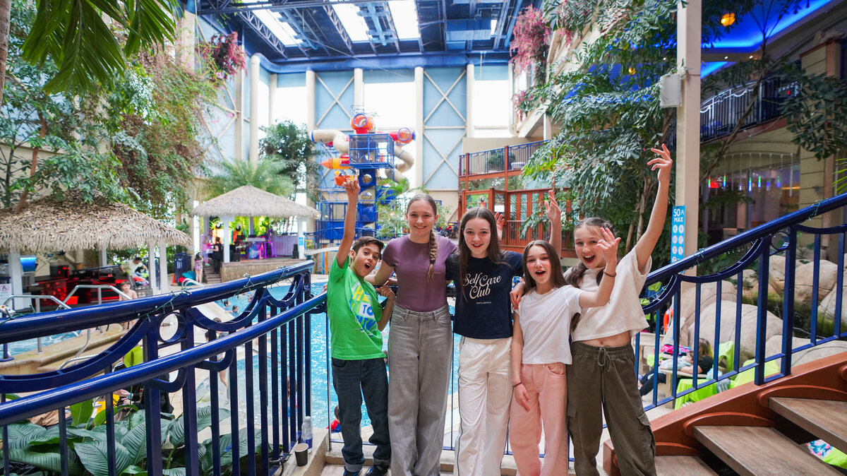 Festive atmosphere with smiling children near the pool - Easter promotion at JARO Hotels